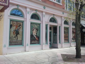 Nice! Painted windows advertising a theater's upcoming season. 